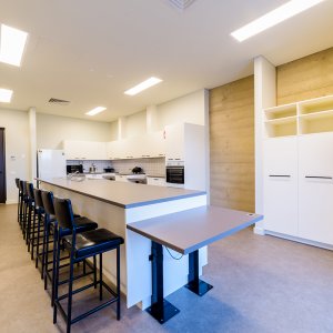 Photo of Training Kitchen highlighting adjustable benches and stoves